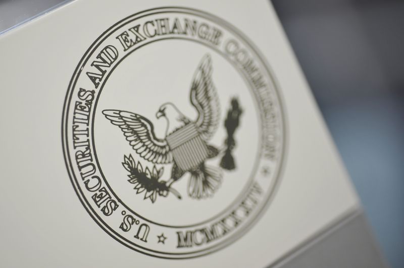 FILE PHOTO: The U.S. Securities and Exchange Commission logo adorns an office door at the SEC headquarters in Washington, June 24, 2011. Picture taken June 24, 2011.  REUTERS/Jonathan Ernst /File Photo