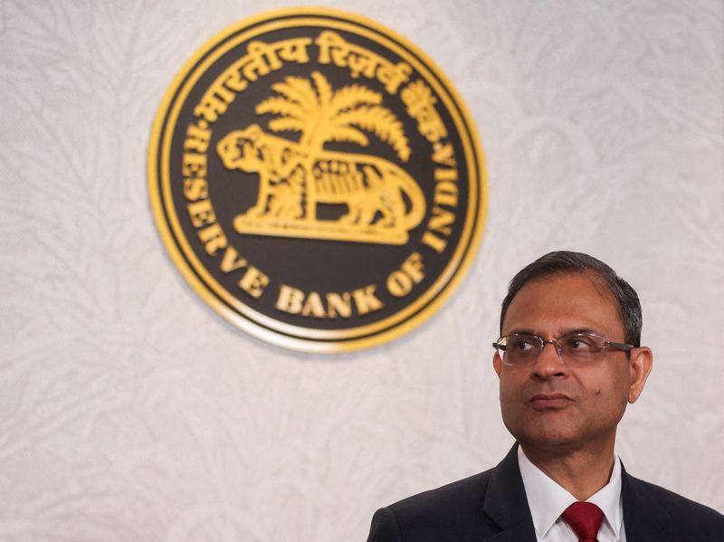 FILE PHOTO: Reserve Bank of India (RBI) Governor Sanjay Malhotra arrives at a press conference in Mumbai, India, February 6, 2026. REUTERS/Francis Mascarenhas/File Photo