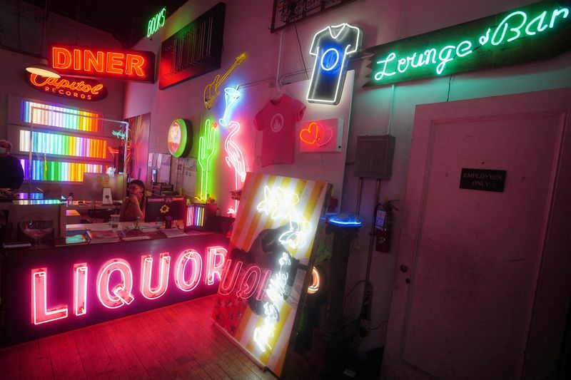 FILE PHOTO: The "Let There Be Neon" store is pictured in the Manhattan borough of New York City, New York, U.S., April 8, 2021. REUTERS/Carlo Allegri/File Photo