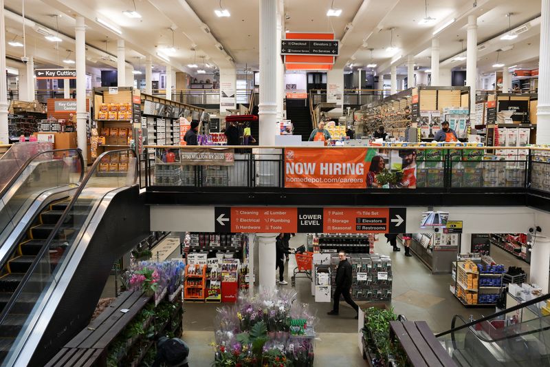 People shop at a Home Depot store in Manhattan in New York City, U.S.,  February 25, 2025. REUTERS/Jeenah Moon