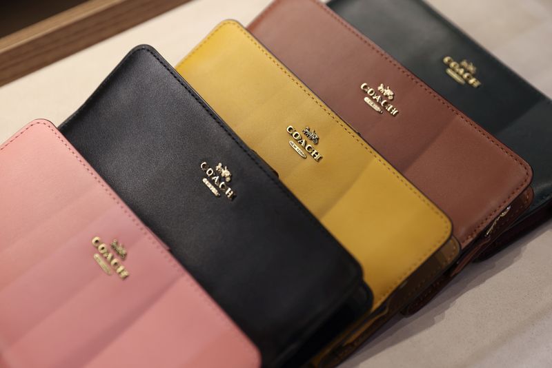 Products are seen in a Coach store, a brand owned by Tapestry, Inc., in Manhattan, New York, U.S., November 15, 2021. REUTERS/Andrew Kelly