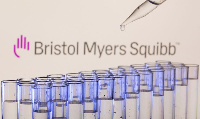 FILE PHOTO: Test tubes are seen in front of a displayed Bristol Myers Squibb logo in this illustration taken, May 21, 2021. REUTERS/Dado Ruvic/Illustration/File Photo