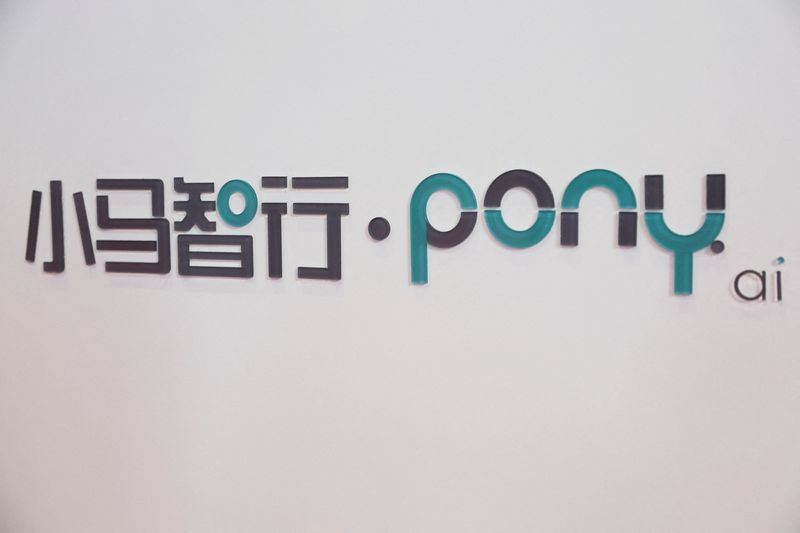 The logo of Pony.ai is pictured at the booth of the Chinese autonomous driving startup during a media day for the Auto Shanghai show in Shanghai, China April 24, 2025. REUTERS/Go Nakamura