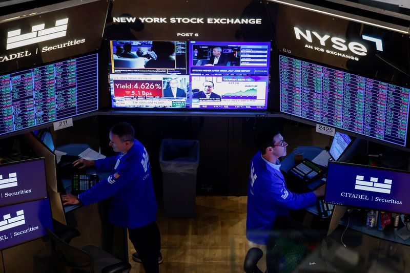 Traders work on the floor of the New York Stock Exchange (NYSE) in New York City, U.S., August 7, 2026. REUTERS/Jeenah Moon