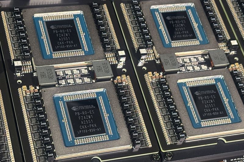 Nvidia's Groq 3 chip are displayed at the company's GTC conference in San Jose, California, U.S., March 17, 2026. REUTERS/Max A. Cherney