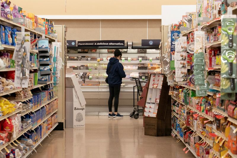 A food shopper browses for groceries at an Albertsons supermarket in Redmond, Washington, U.S., November 24, 2025. REUTERS/David Ryder