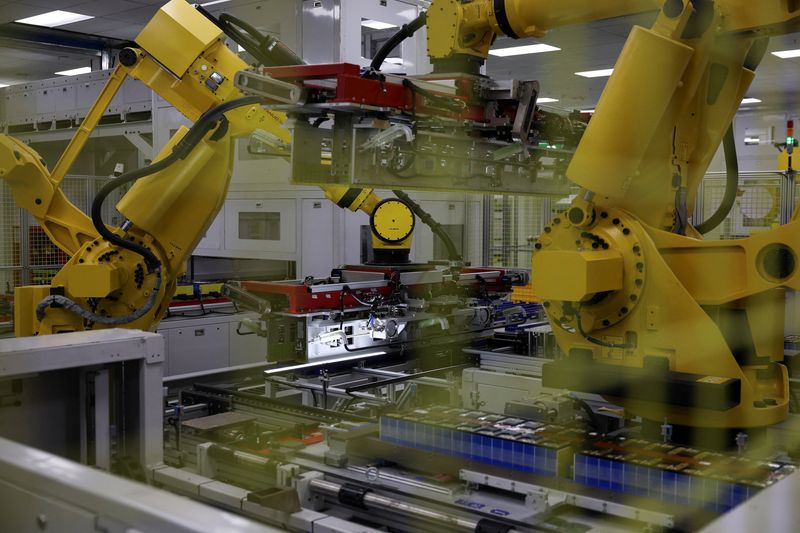 Robotic arms operate on a battery assembly line at the factory of Leapenergy, a unit of Leapmotor, during an organised media tour in Huzhou, Zhejiang province, China, April 26, 2026.  REUTERS/Go Nakamura