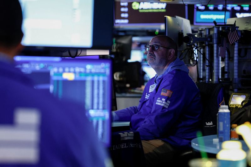 A trader works on the floor of the New York Stock Exchange (NYSE) in New York City, U.S., August 5, 2026. REUTERS/Jeenah Moon