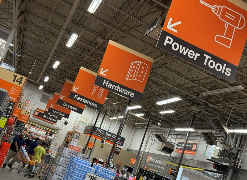 People shop at a Home Depot in Washington, D.C., U.S., July 15, 2025. REUTERS/Jonathan Ernst