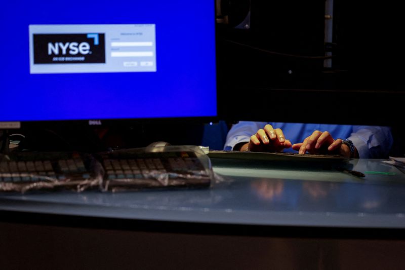A trader works on the floor of the New York Stock Exchange (NYSE) in New York City, U.S., August 18, 2026. REUTERS/Jeenah Moon