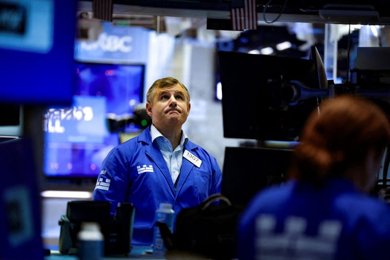 A trader works on the floor of the New York Stock Exchange (NYSE) in New York City, U.S., August 18, 2026. REUTERS/Jeenah Moon