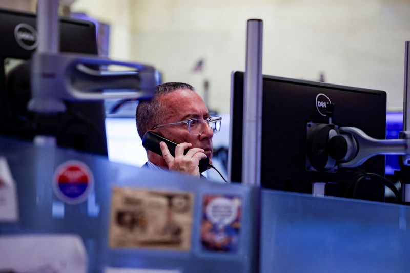 A trader works on the floor of the New York Stock Exchange (NYSE) in New York City, U.S., August 18, 2026. REUTERS/Jeenah Moon