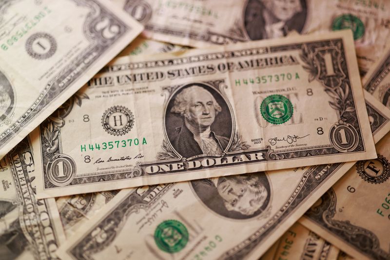U.S. dollar banknotes are seen in this illustration taken March 24, 2026. REUTERS/Dado Ruvic/Illustration