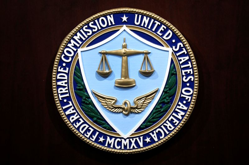 Federal Trade Commission seal is seen at a news conference at FTC Headquarters in Washington, U.S., July 24, 2019. REUTERS/Yuri Gripas