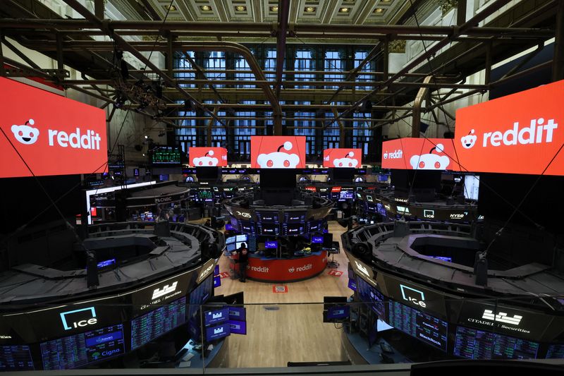 FILE PHOTO: Logos of Reddit are displayed, at the New York Stock Exchange (NYSE) in New York City, U.S., March 21, 2024. REUTERS/Brendan McDermid/File Photo