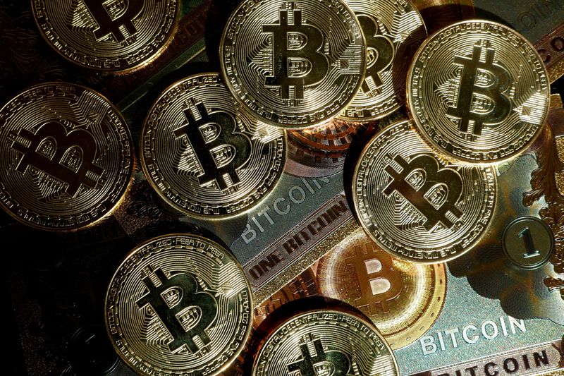 FILE PHOTO: Representations of cryptocurrency bitcoin are seen in this illustration picture created in Paris, France, March 9, 2024. REUTERS/Benoit Tessier/Illustration/File Photo