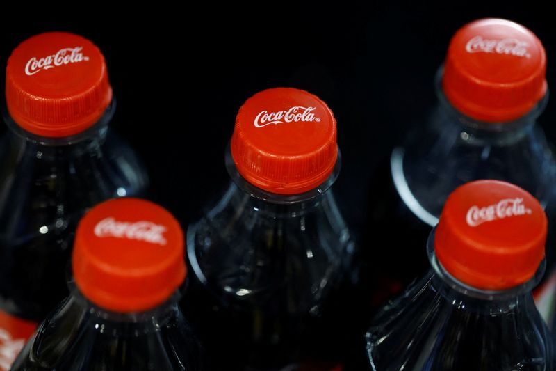 Bottles of Coca-Cola are displayed on a shelf in a supermarket in Paris, France, January 28, 2025. REUTERS/Abdul Saboor/File Photo