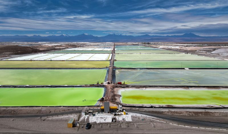 FILE PHOTO: A truck loads concentrated brine at SQM lithium mine at the Atacama salt flat, in Antofagasta region, Chile, May 3, 2023. REUTERS/Ivan Alvarado/File Photo