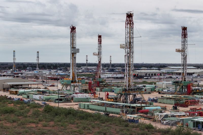 A drone view shows drilling rigs sit in storage at an equipment yard in Odessa, Texas, U.S. June 10, 2025. REUTERS/Eli Hartman/File Photo