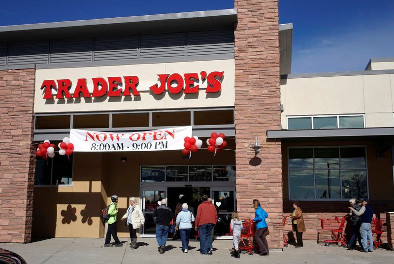 FILE PHOTO: Shoppers line up to enter the Trader Joe's store in Boulder, Colorado February 14, 2014. REUTERS/Rick Wilking/File Photo