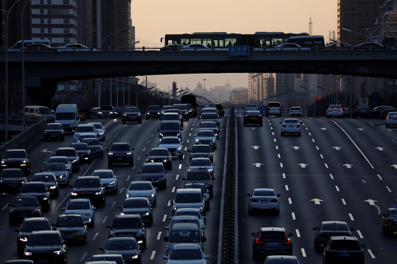 FILE PHOTO: A view shows traffic during evening rush hour at the central business district (CBD) in Beijing, China, January 15, 2021.  REUTERS/Tingshu Wang/File Photo