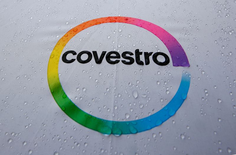 FILE PHOTO: The logo of German chemicals maker Covestro is seen on a wet umbrella in Aachen, Germany, May 2, 2019. REUTERS/Wolfgang Rattay/File Photo