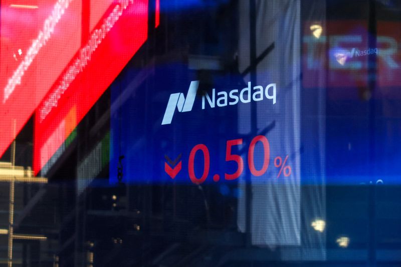Market data is displayed on a screen inside the Nasdaq stock market site in New York City, U.S., April 7, 2025. REUTERS/Kylie Cooper/ File Photo