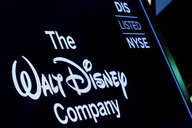 FILE PHOTO: A screen shows the logo and a ticker symbol for The Walt Disney Company on the floor of the New York Stock Exchange (NYSE) in New York, U.S., December 14, 2017. REUTERS/Brendan McDermid/ File Photo