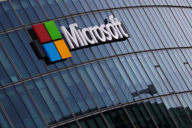 FILE PHOTO: A view shows a Microsoft logo at Microsoft offices in Issy-les-Moulineaux near Paris, France, March 21, 2025. REUTERS/Gonzalo Fuentes/File Photo