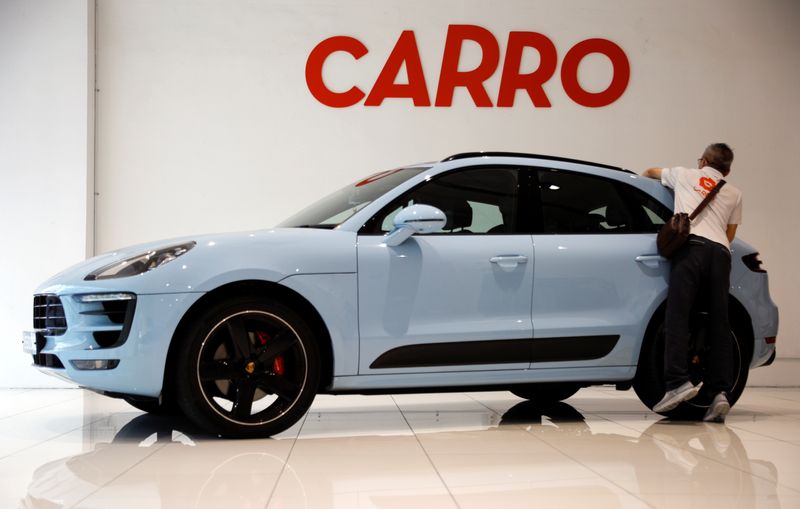 FILE PHOTO: A view of the Carro signage at their showroom in Singapore June 15, 2021.   REUTERS/Edgar Su/File Photo