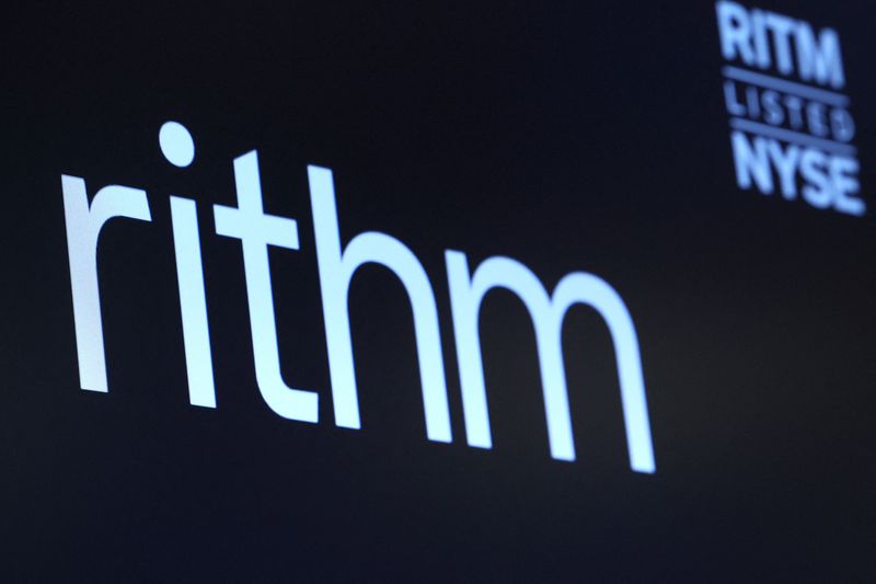 FILE PHOTO: The company logo for Rithm Capital is displayed on a screen on the floor at the New York Stock Exchange (NYSE) in New York City, U.S., February 7, 2024.  REUTERS/Brendan McDermid/File Photo