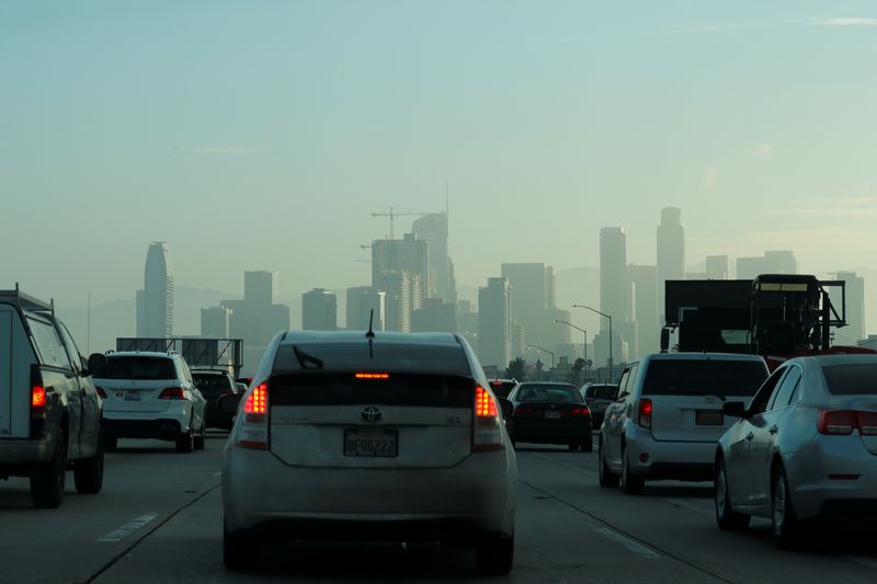 Commuters navigate early morning traffic as they drive towards downtown in Los Angeles, California, U.S., July 22, 2019.    REUTERS/Mike Blake/ File Photo