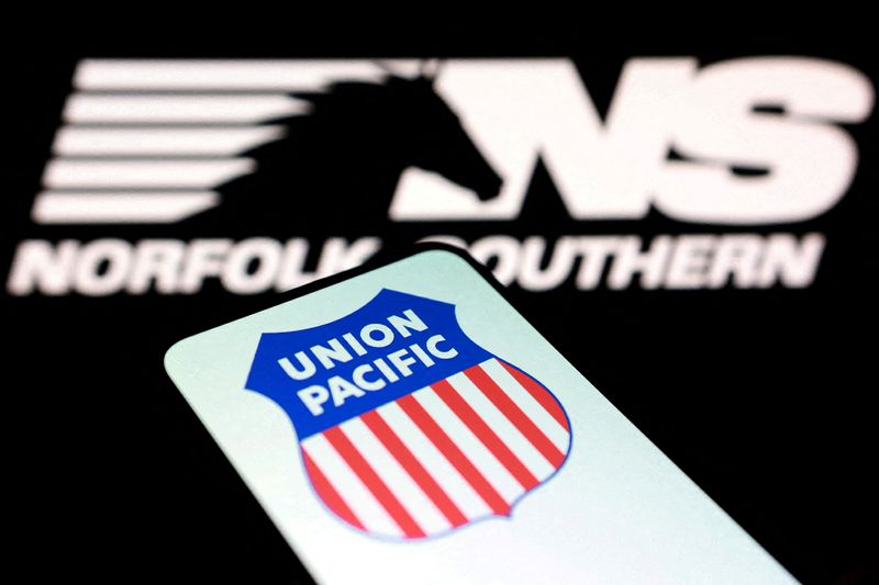 FILE PHOTO: Union Pacific and Norfolk Southern logos are seen in this illustration taken August 5, 2025. REUTERS/Dado Ruvic/Illustration/File Photo