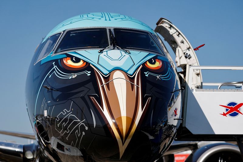 FILE PHOTO: An Embraer E195-E2 Profit Hunter jet is displayed at the 55th International Paris Airshow at Le Bourget Airport near Paris, France, June 17, 2025. REUTERS/Benoit Tessier/File Photo