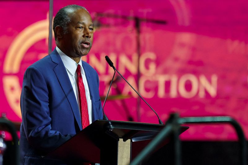 FILE PHOTO: Vice Chair of the Religious Liberty Commission Dr. Ben Carson speaks during a memorial service for slain conservative commentator Charlie Kirk at State Farm Stadium, in Glendale, Arizona, U.S., September 21, 2025.  REUTERS/Daniel Cole/File Photo