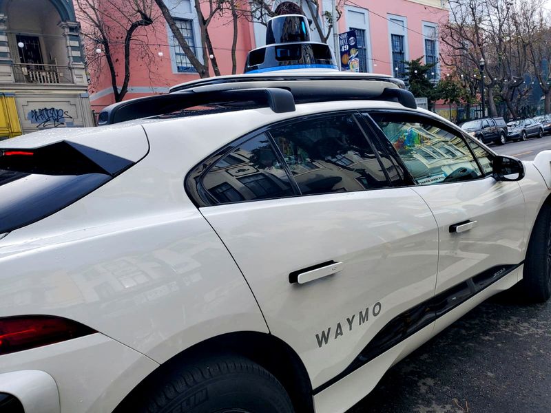 FILE PHOTO: A Waymo rider-only robotaxi is seen during a test ride in San Francisco, California, U.S., December 9, 2022. REUTERS/Paresh Dave/File Photo