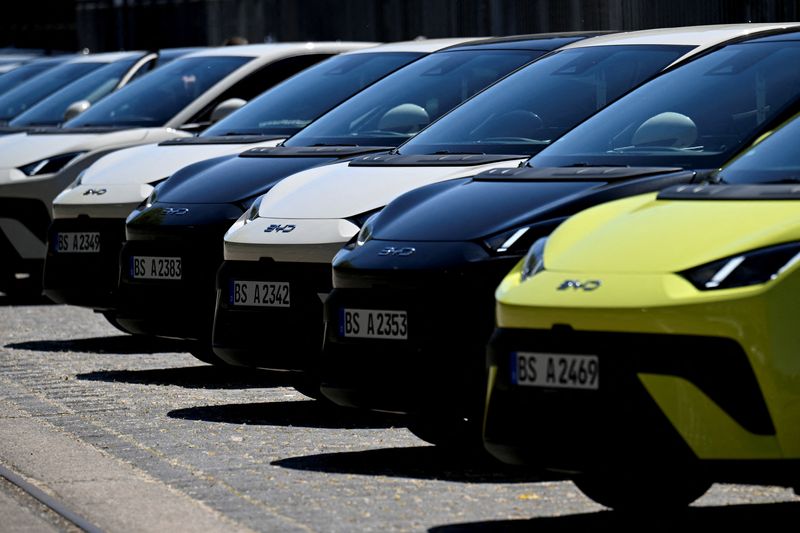 FILE PHOTO: BYD Dolphin Surf electric cars are parked infront of the venue where BYD carmaker holds a vehicle presentation event in Berlin, Germany May 21, 2025. REUTERS/Annegret Hilse/File Photo