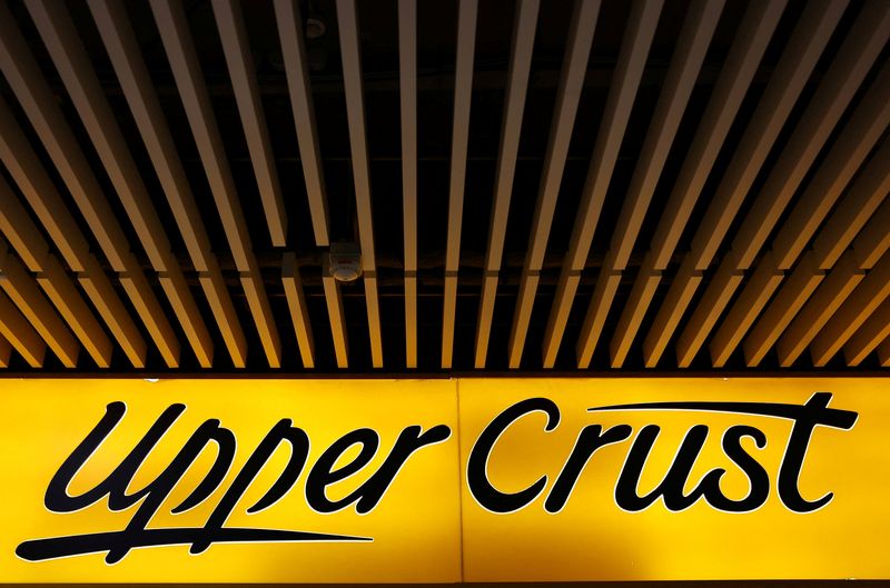 FILE PHOTO: An Upper Crust logo is displayed on a restaurant in London, Britain, January 30, 2024. REUTERS/Hannah McKay/File Photo