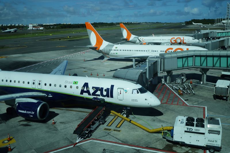 FILE PHOTO: Gol and Azul airlines planes are pictured at Luis Eduardo Magalhaes International Airport in Salvador, Brazil, February 3, 2025. REUTERS/Ueslei Marcelino/File Photo