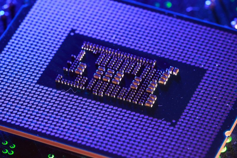 FILE PHOTO: Computer motherboard and Intel chip appear in this illustration taken August 25, 2025. REUTERS/Dado Ruvic/Illustration/File Photo