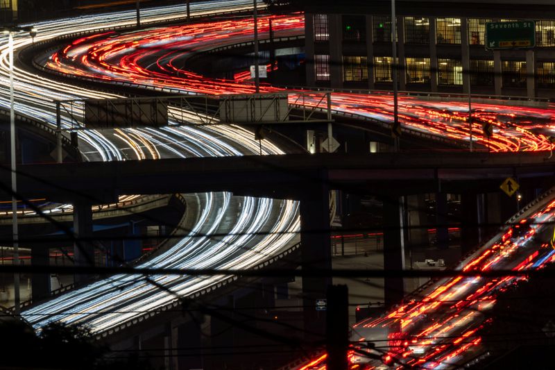 Car traffic is seen during rush hour in downtown San Francisco, California, U.S., July 29, 2025. REUTERS/Carlos Barria