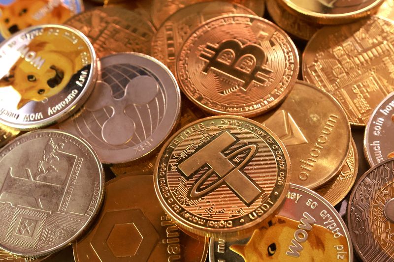 FILE PHOTO: Representation of cryptocurrencies are seen in this illustration taken September 10, 2025. REUTERS/Dado Ruvic/Illustration/File Photo