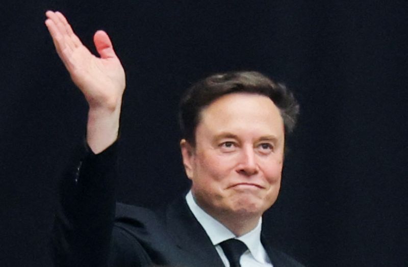 Tesla CEO Elon Musk attends a memorial service for slain conservative commentator Charlie Kirk at State Farm Stadium, in Glendale, Arizona, U.S., September 21, 2025.  REUTERS/Daniel Cole