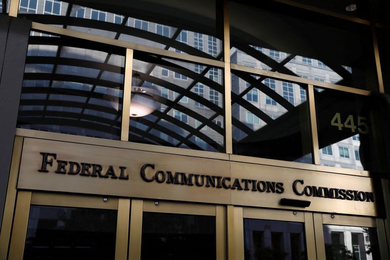 Signage is seen at the headquarters of the Federal Communications Commission in Washington, D.C., U.S., August 29, 2020. REUTERS/Andrew Kelly