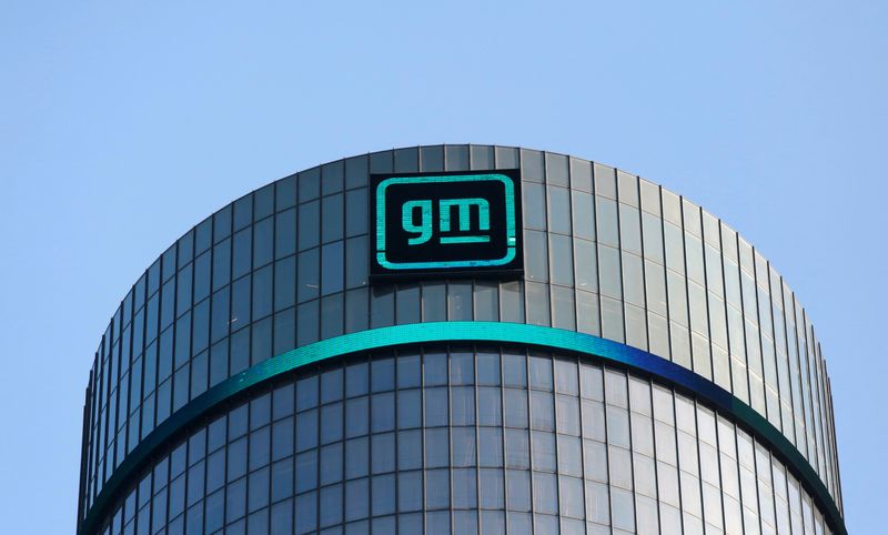 The new GM logo is seen on the facade of the General Motors headquarters in Detroit, Michigan, U.S., March 16, 2021. Picture taken March 16, 2021.  REUTERS/Rebecca Cook