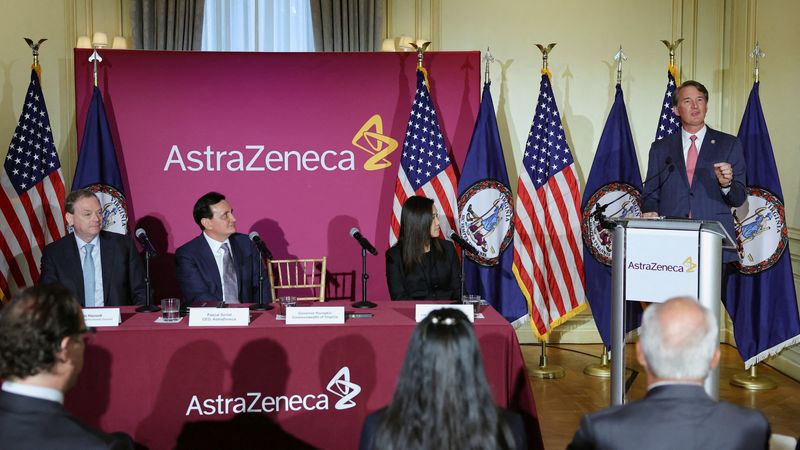 FILE PHOTO: Director of the National Economic Council Kevin Hassett, AstraZeneca CEO Pascal Soriot, and EVP of Global Operations at AstraZeneca Pam Cheng listen as Virginia Governor Glenn Youngkin speaks during a signing event for documents related to a manufacturing site investment, at the Meridian International Center in Washington, D.C., July 21, 2025. REUTERS/Umit Bektas/File Photo