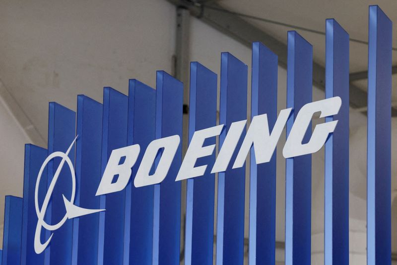 FILE PHOTO: The logo of Boeing company is displayed at the Australian International Airshow in Avalon, Australia March 26, 2025. REUTERS/Hollie Adams/File Photo
