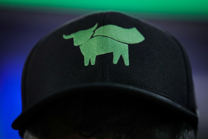 FILE PHOTO: A guest wears a hat during the Beyond Meat IPO at the Nasdaq Market site in New York, U.S., May 2, 2019. REUTERS/Brendan McDermid/File Photo