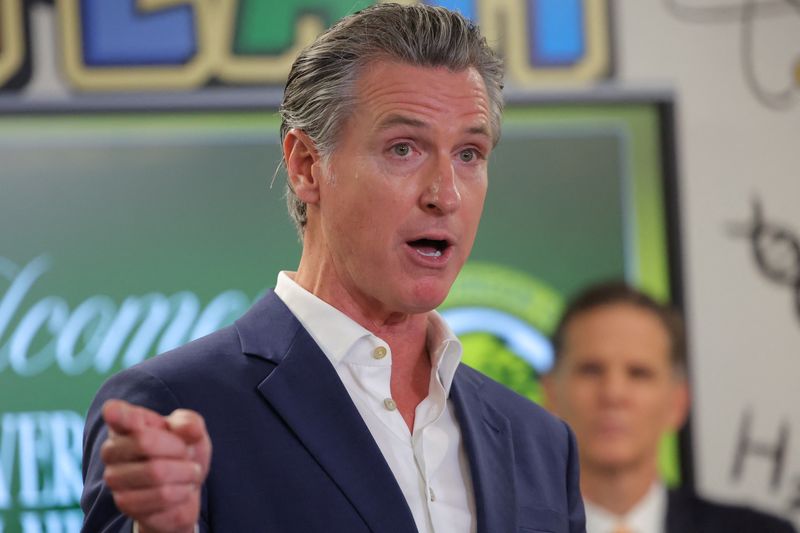 FILE PHOTO: California Governor Gavin Newsom gestures while speaking, as he announces the Golden State Literacy Plan and deployment of literacy coaches statewide, at the Clinton Elementary School in Compton, California, U.S. June 5, 2025. REUTERS/Daniel Cole/File Photo