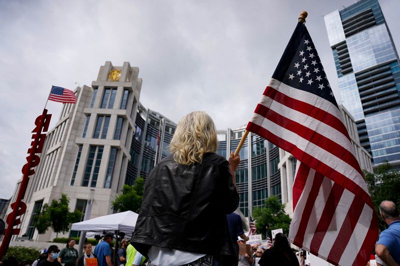 Supporters gather for the arraignment and detention hearing for Kilmar Abrego Garcia, the man wrongly deported from Maryland to El Salvador before being returned to the United States on migrant smuggling charges, in Nashville, Tennessee, U.S., June 13, 2025. REUTERS/Seth Herald